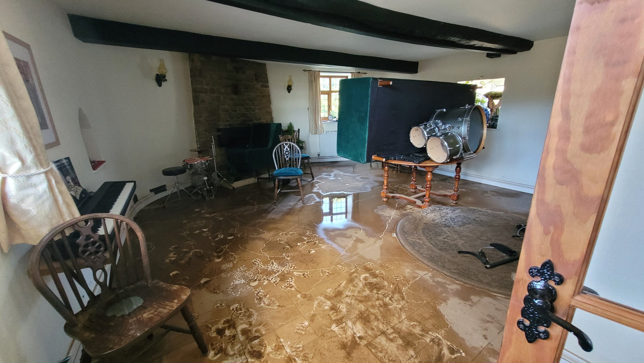 Ground-floor room after floodwater receded