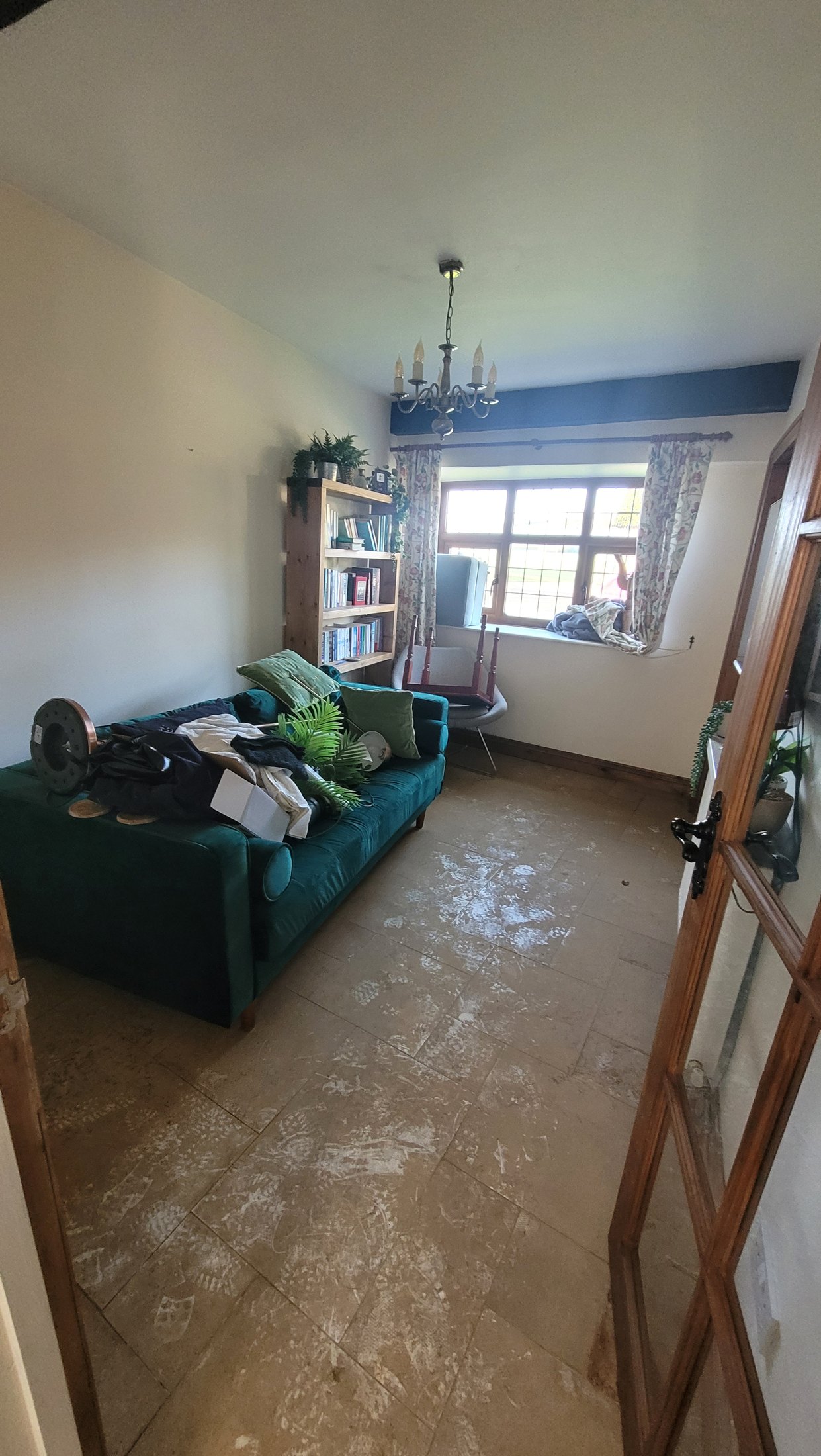 Ground-floor room during early flood recovery